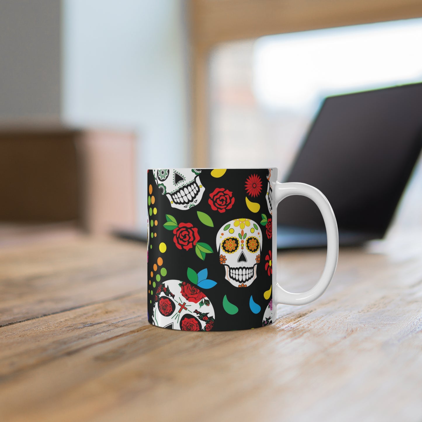 Sugar Skulls custom patterned mug on a desk