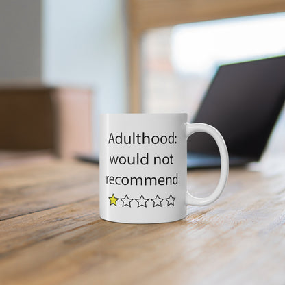 Adulthood. Would Not Recommend funny saying adulting mug on desk