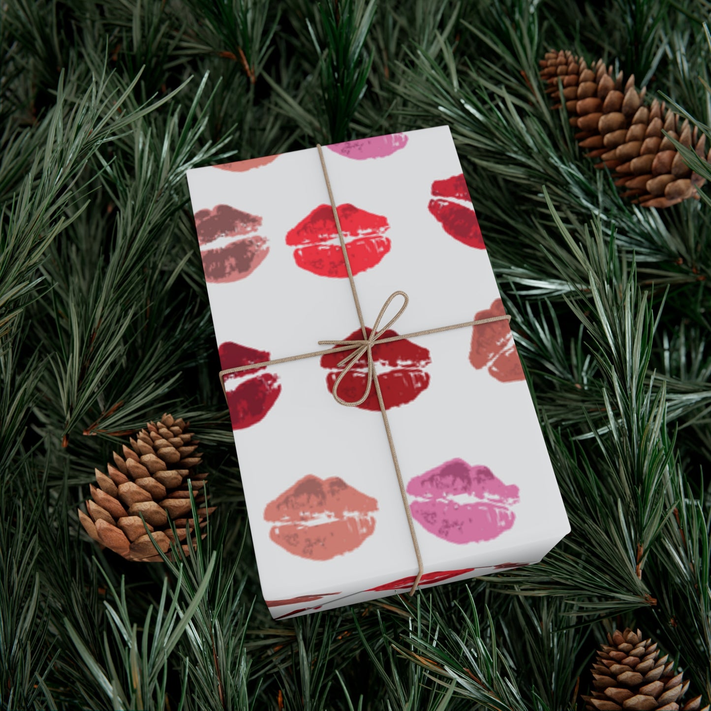 Box wrapped with Kisses from the Misses wrapping paper with Christmas tree background