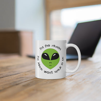 I Am the Reason the Aliens Won't Speak to Us funny saying Alien science fiction mug on desk