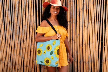 Pretty Black woman in summer with Sunflower patterned tote bag